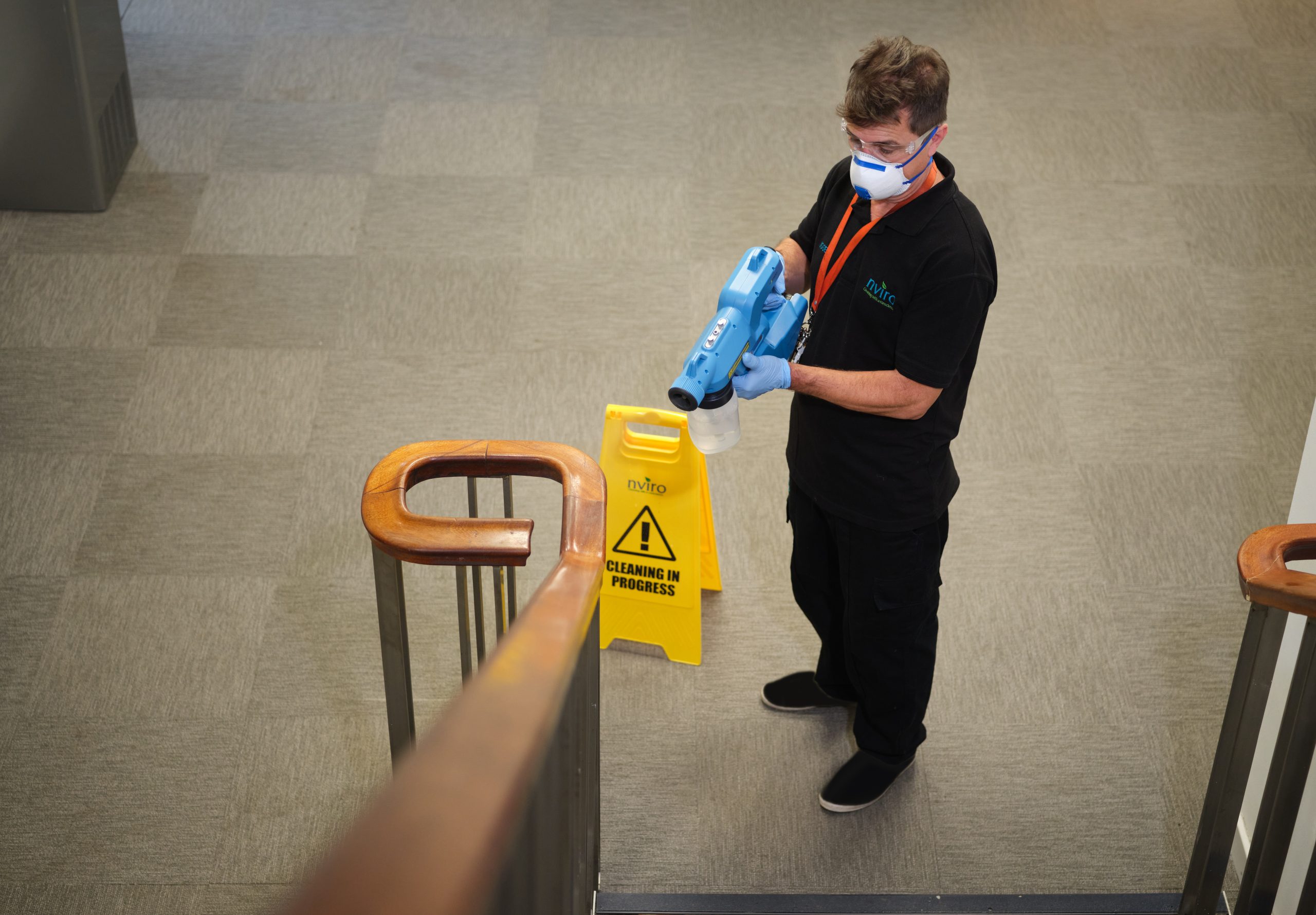 Cleaner spraying surface protection on the handrail